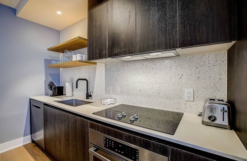 Rainey Street Historic District Condo | 2BR Condo near Rainey St | Heated Pool | Gym | Bar