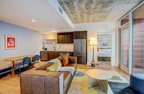 Rainey Street Historic District Condo | 2BR Condo near Rainey St | Heated Pool | Gym | Bar