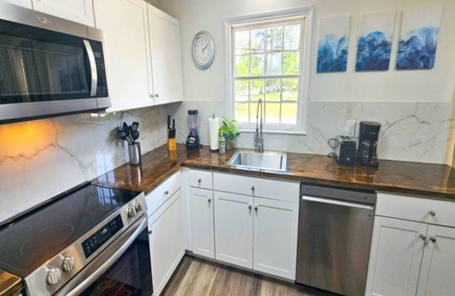 Charlotte House | 2BR Duplex with Massive 86in TV