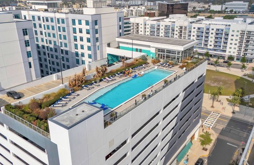 Lake Dot Apartment | 2BR Family Getaway, Rooftop Pool in Downtown Orlando!