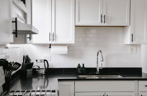 Cragin Apartment | 2BR Sleeps 7 Coffee Station Backyard w/Grill