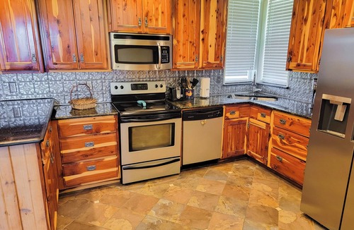 Cleburne House | 2BR Water View Home w/Balcony, Fireplace & AC
