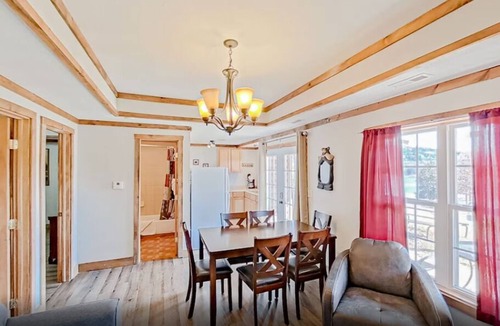Indian Point Condo | 2BR Waterfront Duplex Cabin w/Pool + Swim & Boat dock