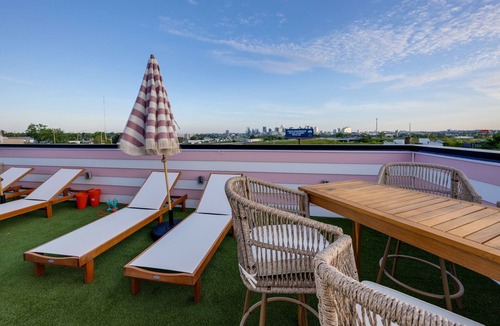 Katie Hill Neighborhood House | 2SBSide Homes 8 Bedrooms, Ultra Heated Rooftop Pools,Arcade,Elevator, Sleeps 23!