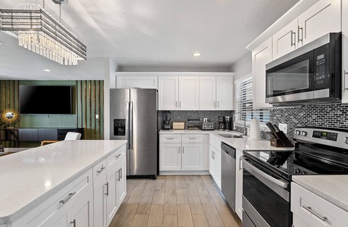 Florida Central Atlantic Coast House | 3/2 plus bonus room W/heated pool & jacuzzi centrally located