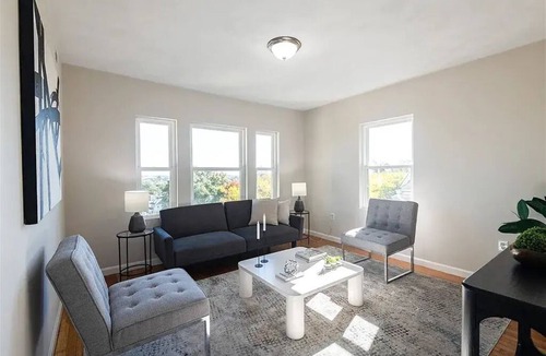 Codman Square Condo | 3-bd condo near Red Line, unit A/C & laundry - perfect for long World Cup stays!