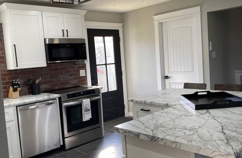 Marshall House | 3-bedroom 1 bath.Fenced private backyard inground swimming pool. Covered patio