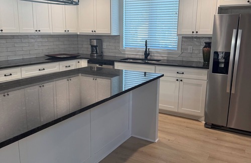 Woodward House | 3-bedroom 2 and a half bath bungalow in superb Woodward with a warm fireplace!