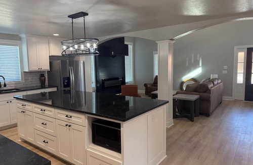 Woodward House | 3-bedroom 2 and a half bath bungalow in superb Woodward with a warm fireplace!