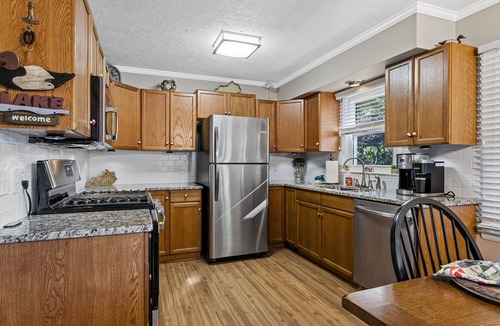 Cadiz House | 3 bedroom/2 full bath lakefront home with gentle slope to private covered dock