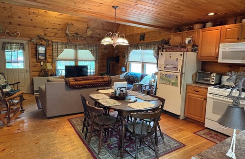 Greenville Junction Cabin | 3-bedroom cabin in heart of Greenville, WiFi, Roku, & snowmobile from driveway!