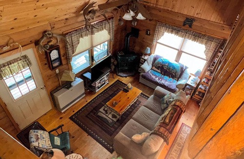 Greenville Junction Cabin | 3-bedroom cabin in heart of Greenville, WiFi, Roku, & snowmobile from driveway!
