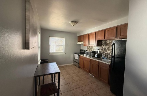 Oak Park Condo | 3-bedroom condo in charming Oak Park with WiFi, AC, laundry, garage and basement