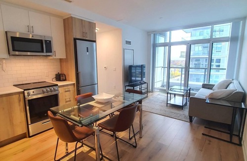 The Queensway Condo | 3 bedroom Modern Condo Bright Great Location + Gym