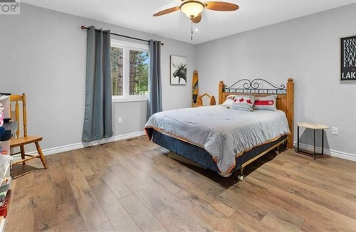 Madawaska Valley Cottage | 3 bedroom open concept Lake front house with shallow entry, sandy bottom beach