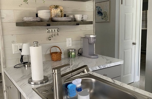 Holmes Beach Apartment | 3 Minute walk to beautiful AMI beach! Old Florida Charm with a Modern Flair!