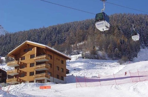 Grimentz Apartment | 3-room apartment for 5 persons : Living room with 1 sofa-bed - kitchen with dishwasher and microwave