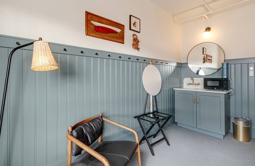 Poulsbo House | 3 rooms at Historic Hotel Scandi with living area, 3 kitchenettes, & city views