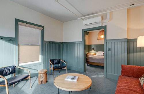 Poulsbo House | 3 rooms at Historic Hotel Scandi with living area, 3 kitchenettes, & city views