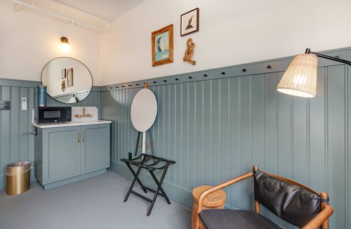 Poulsbo House | 3 rooms at Historic Hotel Scandi with living area, 3 kitchenettes, & city views