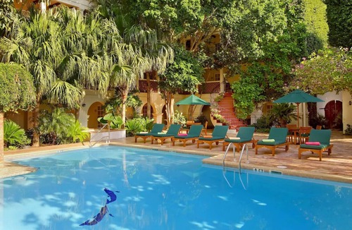 Western Division House | 3-Unit Historic Gem | Relaxing Pool, Dining & Central Downtown Vibe