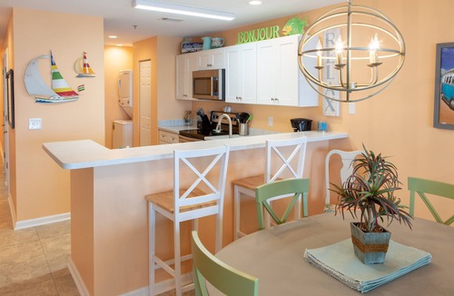 Tybee Island Condo | 30 Steps to the Beach! Luxury Condo with Large wrap-around porch!