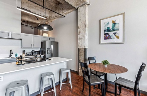 Crossroads Arts District Apartment | 3BR Stunning Downtown Historic Loft with Gym