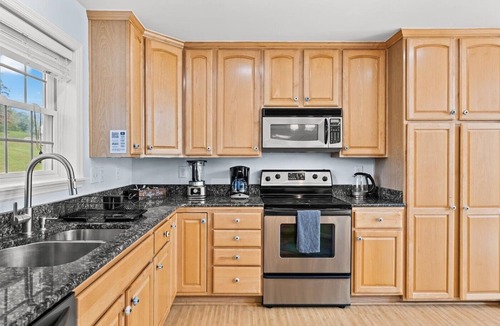 Livingston House | 4-bedroom 3-bath Lakefront home with private dock. Can sleep up to 14 people.