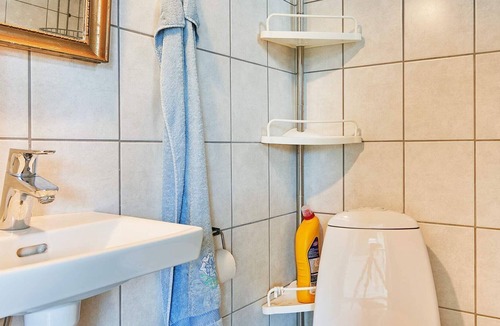 Osterlars Apartment | 4 person holiday home in Gudhjem
