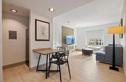 FM 1960 Hotel | 4 Restful Rooms Ideal for Weekend Group Adventures + Outdoor Pool Access