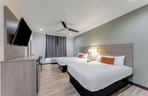 Eastside Promise Neighborhood Hotel | 4 Rooms w/Free Breakfast Ideal for Travelers on I-10 & 1-35 - Easy Access
