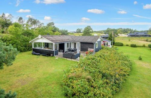 Egsmark Strand House | 4 star holiday home in Ebeltoft