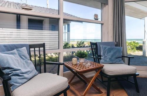 Hasmark Strand House | 4 star holiday home in Otterup