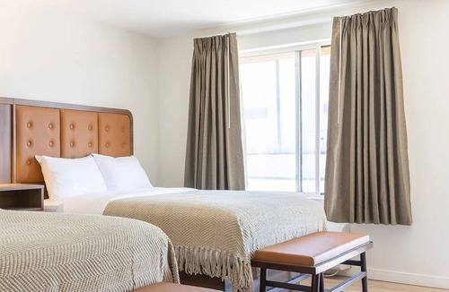 Talbot's Corner Hotel | 4 Welcoming East Nashville Rooms | Pool & Free Parking Onsite | Pets Allowed