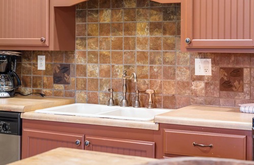 Branson Theater District Cabin | "417 Dirt Road" Cabin for Two - Soaking Tub, Gas Fireplace, Covered Balcony
