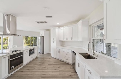 Pine Castle Villa | 4BR Lakefront Home w/ Dock & Private Views