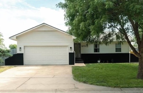 Wichita House | 4BR Retreat Great for Groups with Office Space, Fire Pit & Large Fenced Yard
