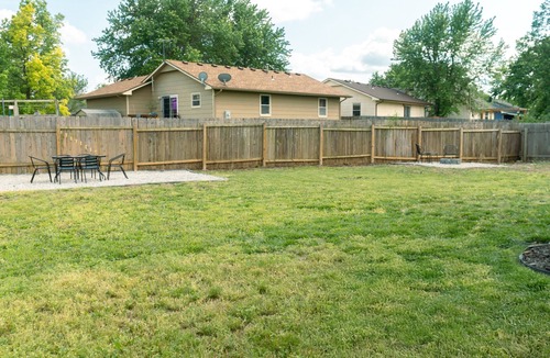 Wichita House | 4BR Retreat Great for Groups with Office Space, Fire Pit & Large Fenced Yard