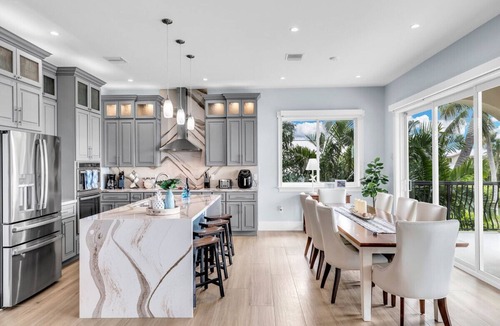 Key Colony Beach House | 5 bedrooms, pool/spa heated, bikes, kayaks, game room, elevator, deep 75' dock.