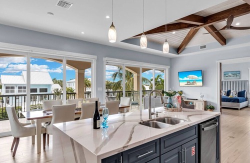 Key Colony Beach House | 5 bedrooms, pool/spa heated, bikes, kayaks, game room, elevator, deep 75' dock.