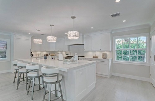 Singer Island Villa | 5 Min Walk to Beach ~ Heated Pool ~ Dock ~ Bikes