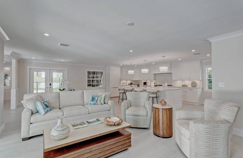 Singer Island Villa | 5 Min Walk to Beach ~ Heated Pool ~ Dock ~ Bikes