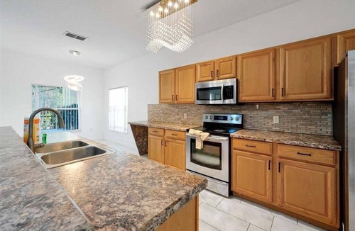 Cumbrian Lakes House | 5-Star Gem in Kissimmee with Game Room