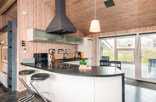 Pøt Strandby House | 5 star holiday home in Juelsminde