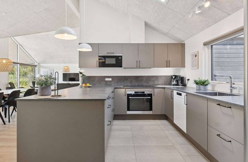 Hasmark Strand House | 5 star holiday home in Otterup