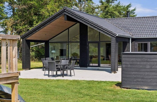 Hasmark Strand House | 5 star holiday home in Otterup