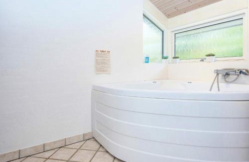Grena Strand House | 5 star holiday home in Grenaa