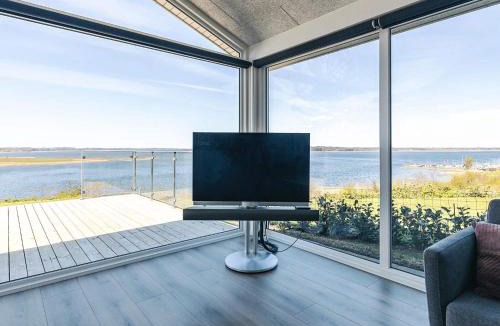 Hjarbæk House | 5 star holiday home in Løgstrup