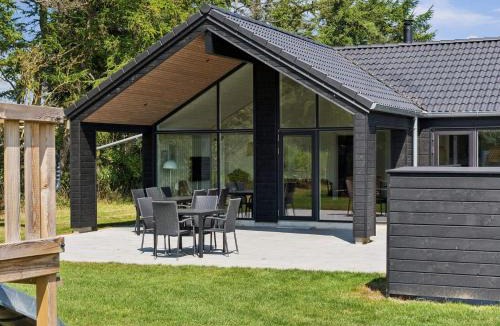 Hasmark Strand House | 5 star holiday home in Otterup