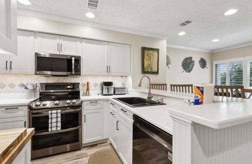 American Beach Condo | 505 Sailmaker Poolside with balcony ~Pet-Friendly